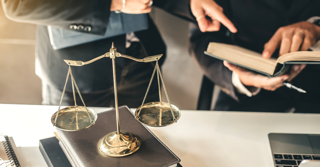 balanced scales on books in dui attorney office