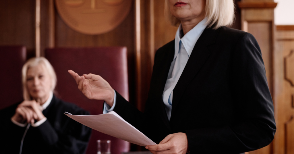 lawyer reading testimony in dui defense court